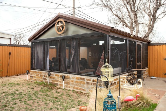 4602 S Georgia St, Amarillo, TX 79110 - view of outbuilding featuring a sunroom