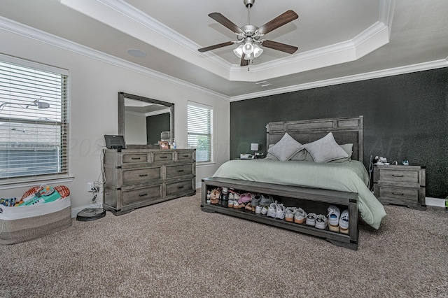 8906 Witmer Ct, Amarillo, TX 79119 - carpeted bedroom with a raised ceiling, crown molding, baseboards, and ceiling fan