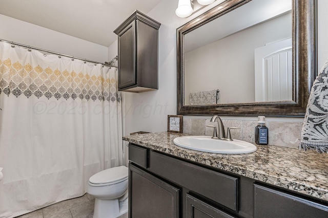 8906 Witmer Ct, Amarillo, TX 79119 - full bath with vanity, toilet, tile patterned floors, and shower / tub combo with curtain