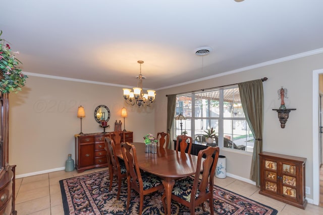 2314 Atkinsen St, Amarillo, TX 79106 - dining area featuring light tile patterned floors, crown molding, and a chandelier