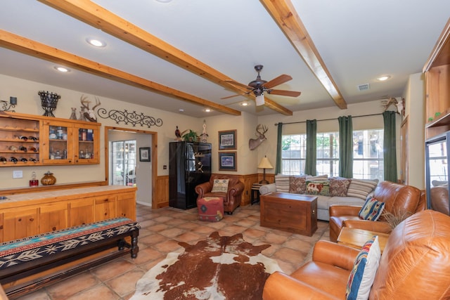2314 Atkinsen St, Amarillo, TX 79106 - living area with healthy amount of natural light, beamed ceiling, ceiling fan, recessed lighting, and a wainscoted wall