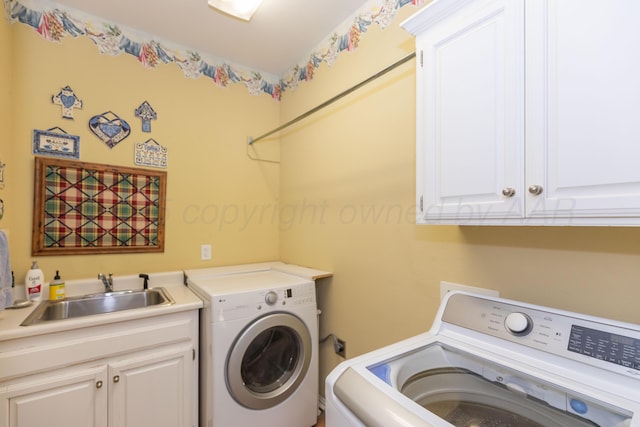 2314 Atkinsen St, Amarillo, TX 79106 - washroom featuring washer and dryer and cabinet space