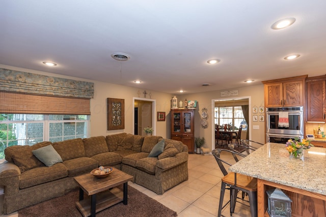 2314 Atkinsen St, Amarillo, TX 79106 - living area featuring light tile patterned flooring and recessed lighting