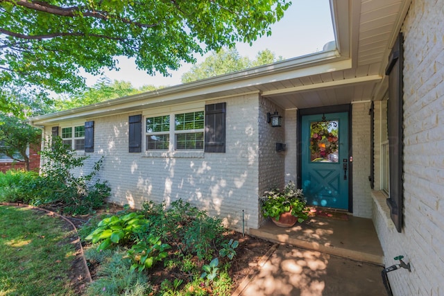 2314 Atkinsen St, Amarillo, TX 79106 - view of exterior entry featuring brick siding