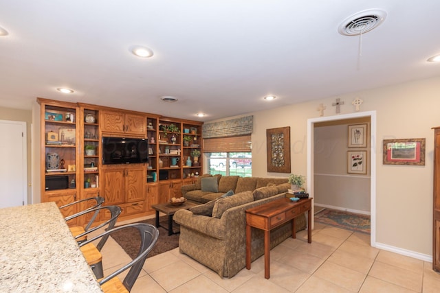 2314 Atkinsen St, Amarillo, TX 79106 - living area with light tile patterned floors and recessed lighting