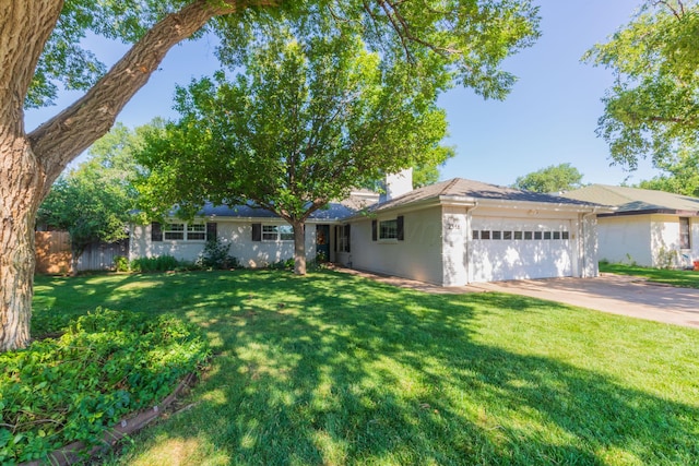 2314 Atkinsen St, Amarillo, TX 79106 - ranch-style house featuring a garage, a front lawn, driveway, and a chimney