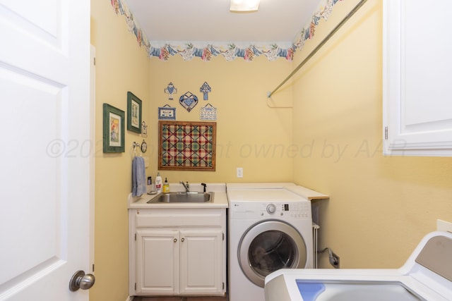 2314 Atkinsen St, Amarillo, TX 79106 - laundry room with cabinet space and independent washer and dryer