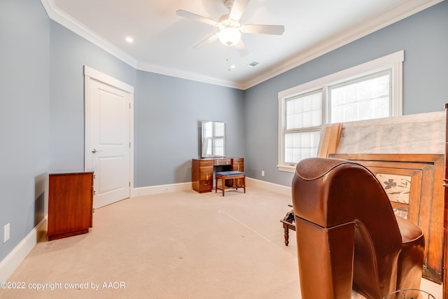 office with ceiling fan, plenty of natural light, light carpet, and ornamental molding