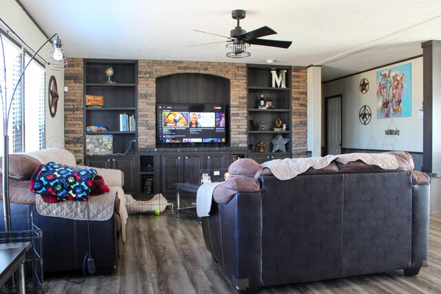 420 N 18th St, Memphis, TX 79245 - living room featuring a ceiling fan, built in features, and wood finished floors