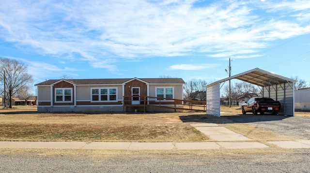 420 N 18th St, Memphis, TX 79245 - manufactured / mobile home with a carport and driveway