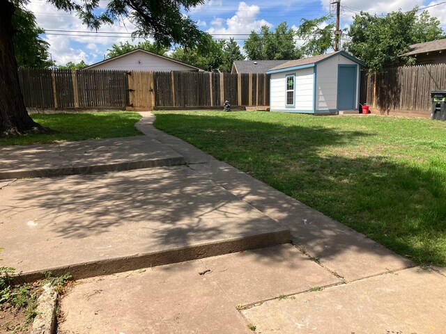 3704 Westlawn Ave, Amarillo, TX 79102 - view of yard featuring an outdoor structure and a gate