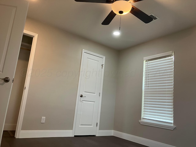 3704 Westlawn Ave, Amarillo, TX 79102 - spare room featuring a ceiling fan and dark wood-style floors