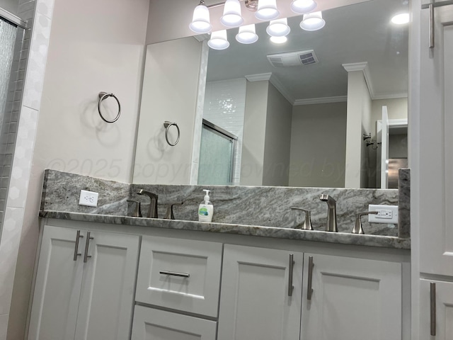 3704 Westlawn Ave, Amarillo, TX 79102 - bathroom with ornamental molding, double vanity, and a shower with shower door