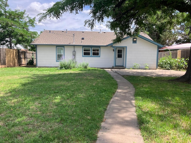 3704 Westlawn Ave, Amarillo, TX 79102 - ranch-style home featuring roof with shingles and a patio