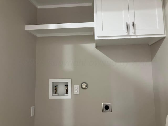 3704 Westlawn Ave, Amarillo, TX 79102 - laundry room featuring washer hookup, hookup for a gas dryer, hookup for an electric dryer, and cabinet space