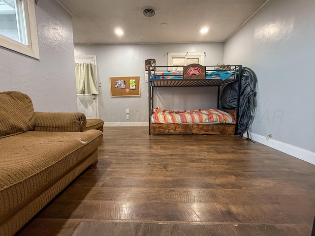 1105 Main St, Panhandle, TX 79068 - bedroom with wood finished floors and recessed lighting