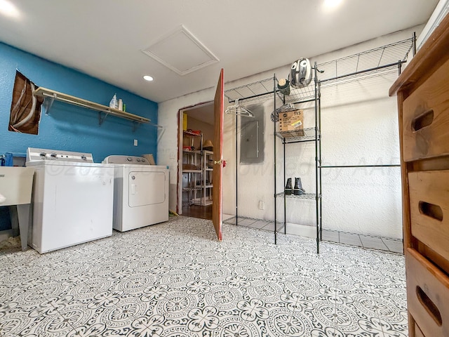 1105 Main St, Panhandle, TX 79068 - laundry room with washer and dryer, attic access, recessed lighting, and electric panel