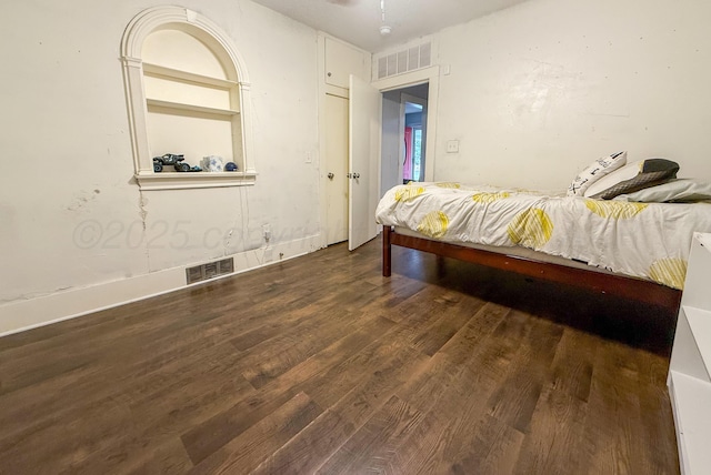 1105 Main St, Panhandle, TX 79068 - bedroom featuring wood finished floors