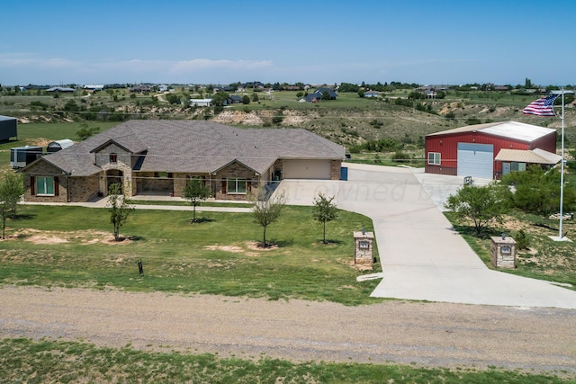 view of front of house with an outbuilding