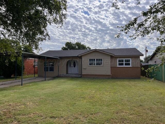 1605 S Colgate St, Perryton, TX 79070 - view of front facade featuring a carport and driveway