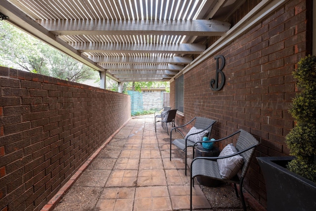 view of patio / terrace featuring a pergola