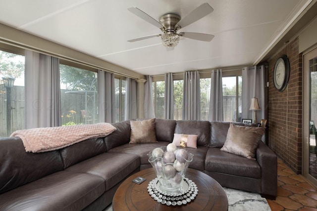 sunroom / solarium with ceiling fan