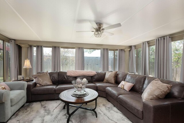 sunroom / solarium with ceiling fan