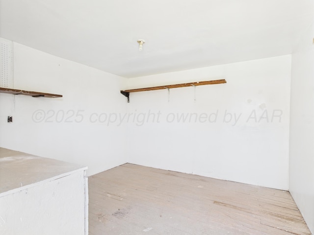 803 R Ave, Sunray, TX 79086 - unfurnished room featuring light wood finished floors