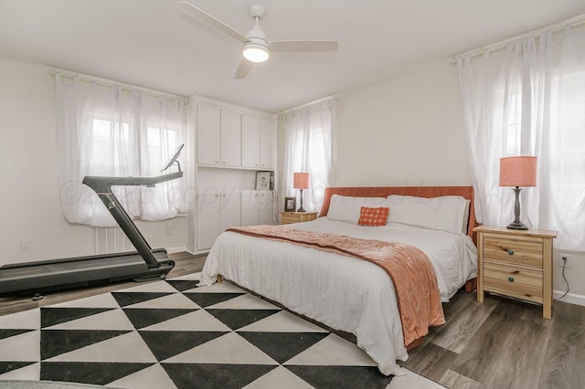 1033 Bowie St, Amarillo, TX 79102 - bedroom featuring wood finished floors and ceiling fan
