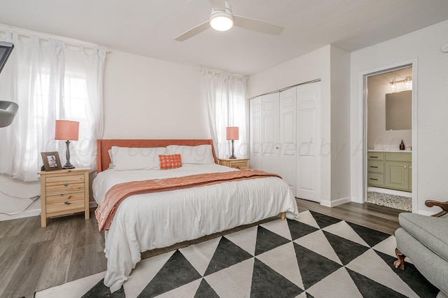 1033 Bowie St, Amarillo, TX 79102 - bedroom with wood finished floors, a closet, ensuite bath, and a ceiling fan