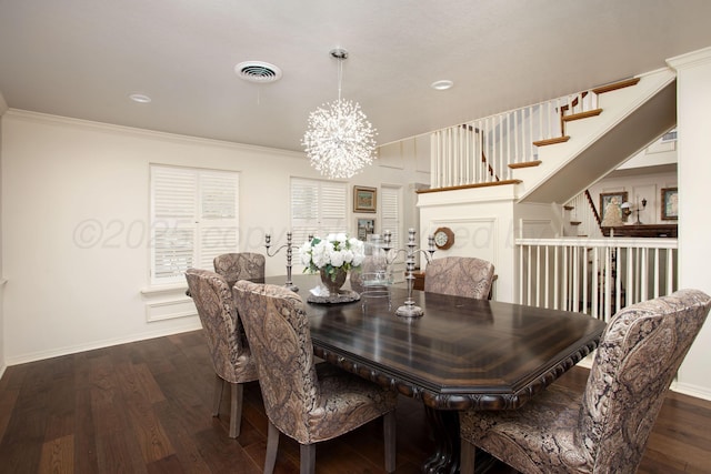 4214 Roxton Dr, Amarillo, TX 79109 - dining space with a chandelier, dark wood-style floors, ornamental molding, and recessed lighting