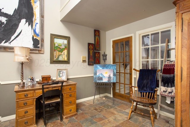 4214 Roxton Dr, Amarillo, TX 79109 - office area featuring dark stone finish floors and baseboards
