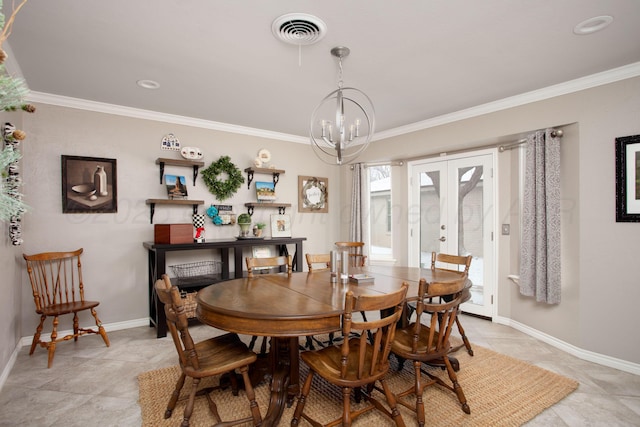 4214 Roxton Dr, Amarillo, TX 79109 - dining area with french doors, ornamental molding, a chandelier, and light tile patterned floors