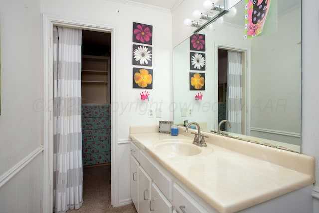 4214 Roxton Dr, Amarillo, TX 79109 - full bath with vanity and ornamental molding