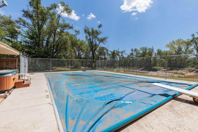 830 Burnett St, Miami, TX 79059 - view of pool with fence and a hot tub