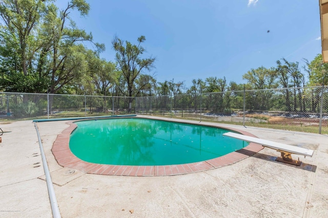830 Burnett St, Miami, TX 79059 - view of pool featuring a patio, a diving board, fence, and a fenced in pool