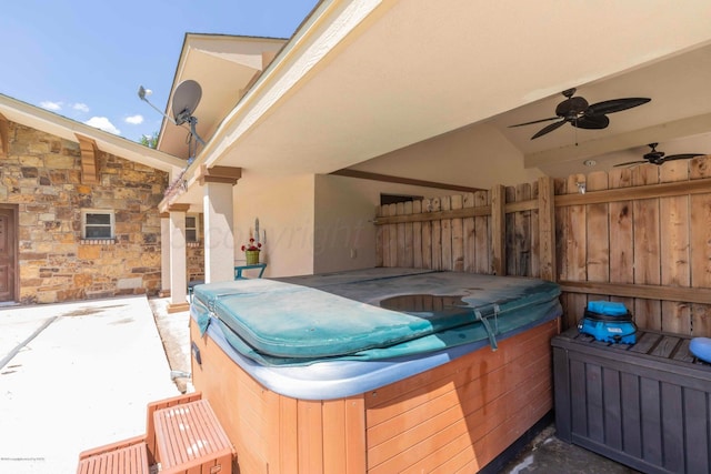 830 Burnett St, Miami, TX 79059 - view of patio with a ceiling fan and a hot tub