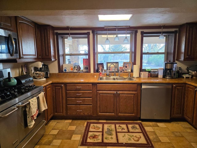 830 Burnett St, Miami, TX 79059 - kitchen with a sink and appliances with stainless steel finishes