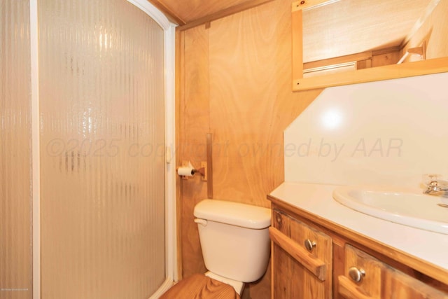 830 Burnett St, Miami, TX 79059 - bathroom featuring toilet, vanity, and a shower stall
