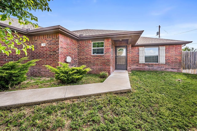 4529 Katharina Ct, Amarillo, TX 79110 - view of front of house featuring brick siding and roof with shingles