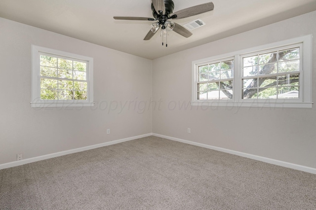 6011 Palmetto Trl, Amarillo, TX 79106 - unfurnished room with carpet floors, baseboards, and a ceiling fan
