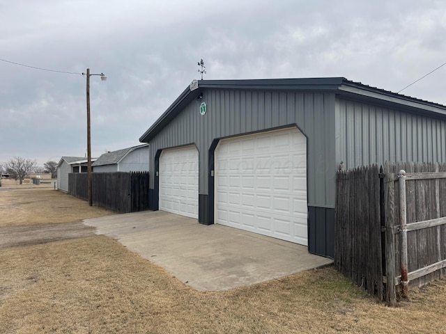 detached garage with fence