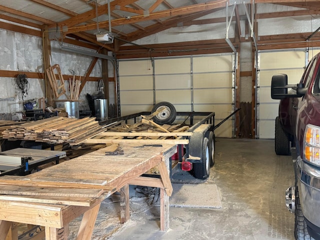 garage featuring a garage door opener