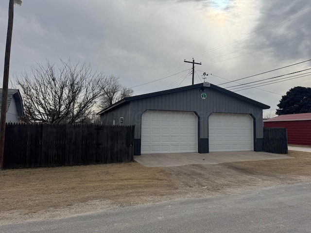 detached garage with fence