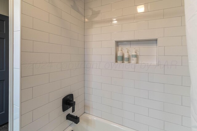 bathroom featuring shower / bathtub combination with curtain