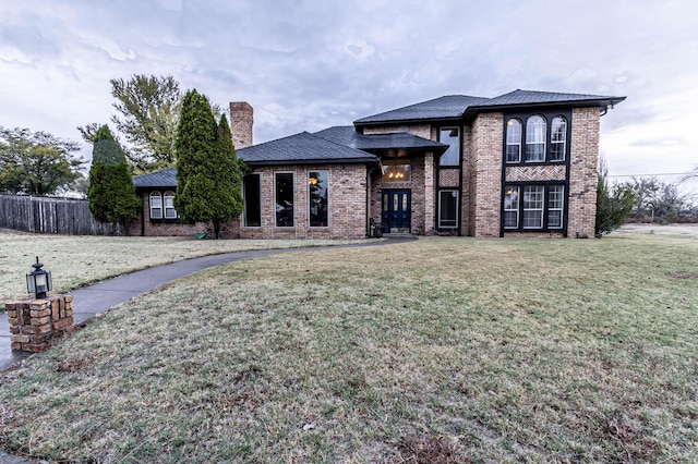 view of front of house with a front lawn