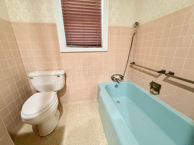 715 Ave P, Sunray, TX 79086 - full bath with wallpapered walls, toilet, a bath, tile walls, and a shower