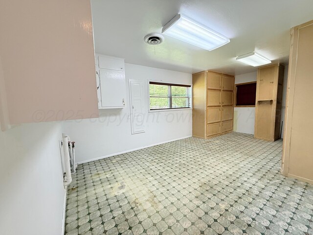 715 Ave P, Sunray, TX 79086 - spare room with baseboards