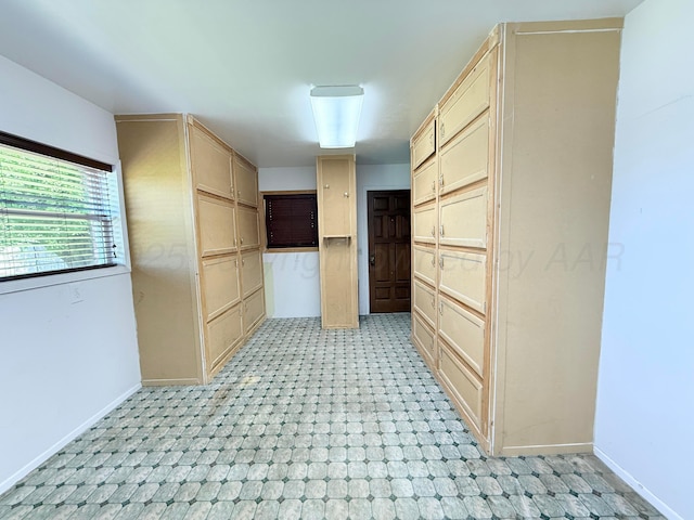 715 Ave P, Sunray, TX 79086 - walk in closet featuring light flooring