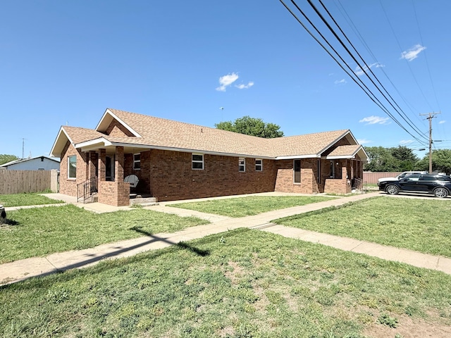 715 Ave P, Sunray, TX 79086 - view of front of property with brick siding and roof with shingles